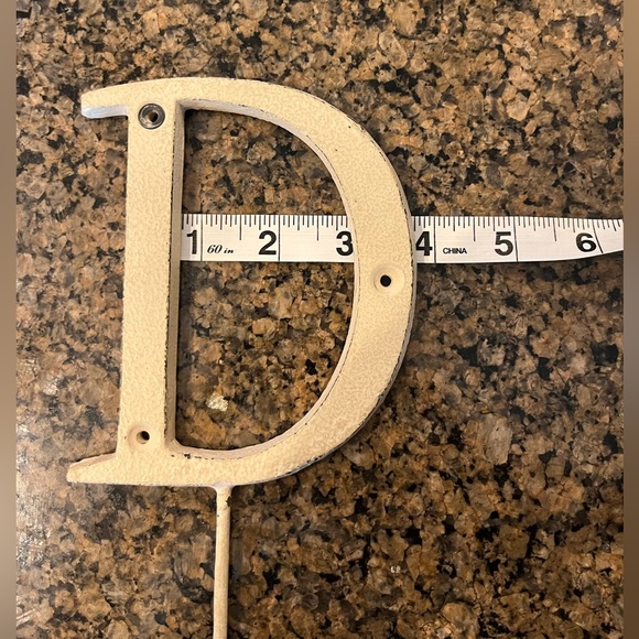 Cream/off white metal hanging letter “D” to hang towels, keys, or clothes on. - Picture 5 of 7